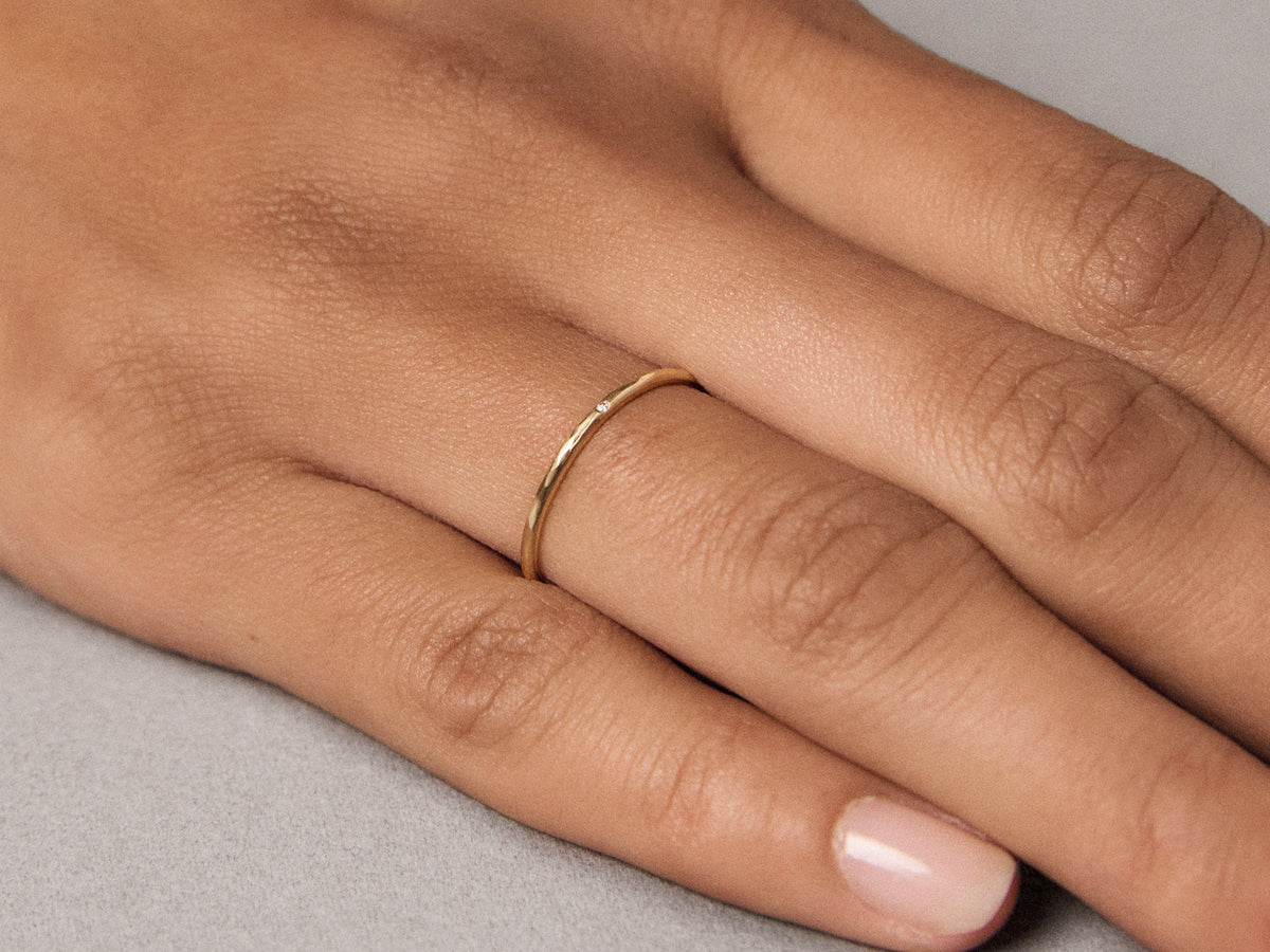 Mon Chéri thin round white diamond hammered gold wedding ring