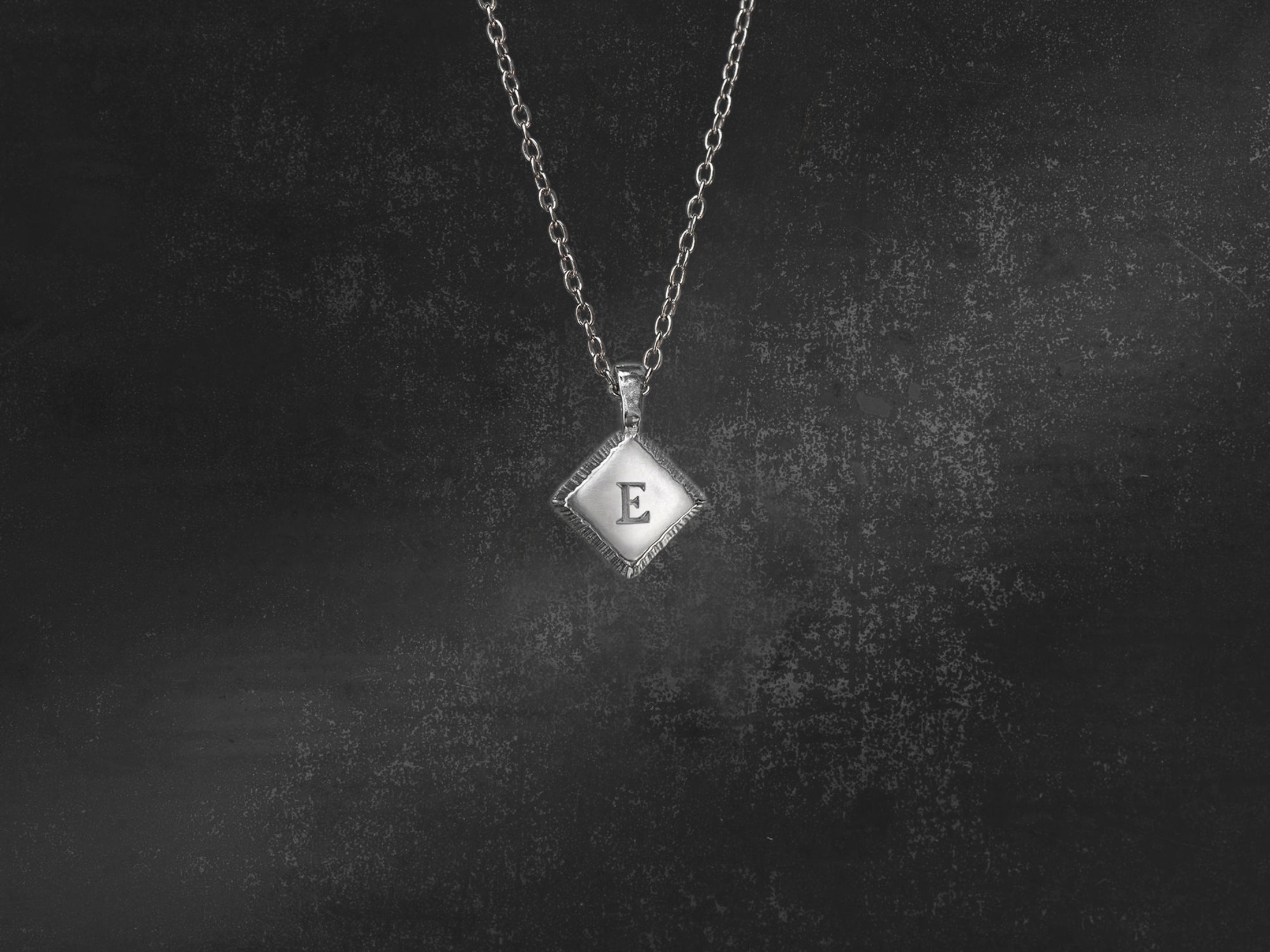 Adama necklace white gold 1 letter